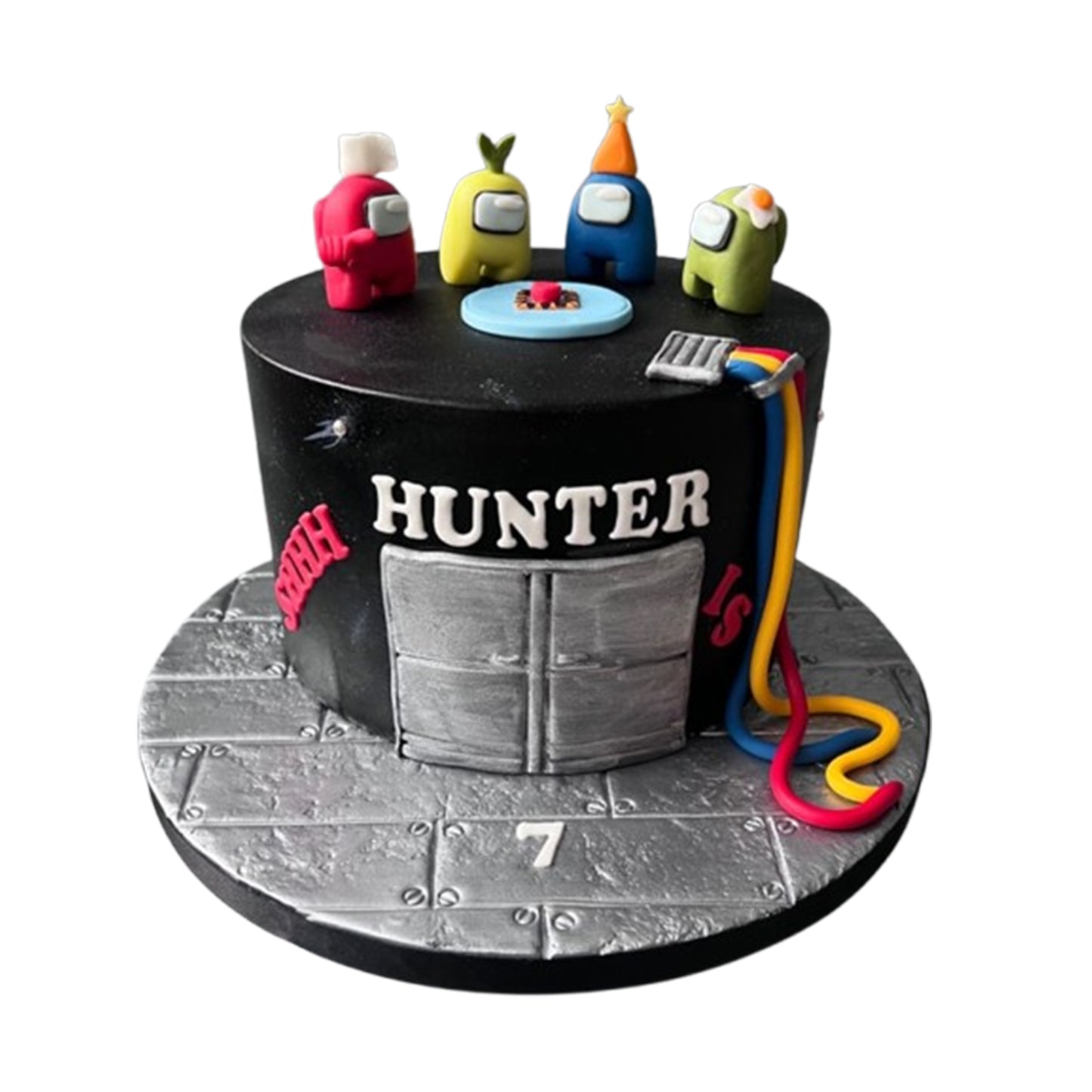 Among Us cake featuring a dark impostor crewmate