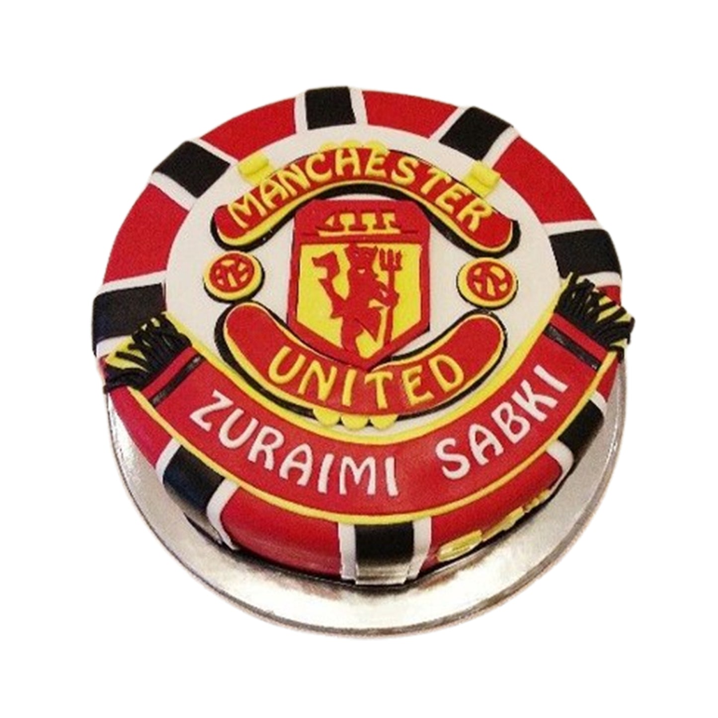 Manchester United-themed cake featuring small fondant figurines of the Red Devil mascot, adding excitement for football fans