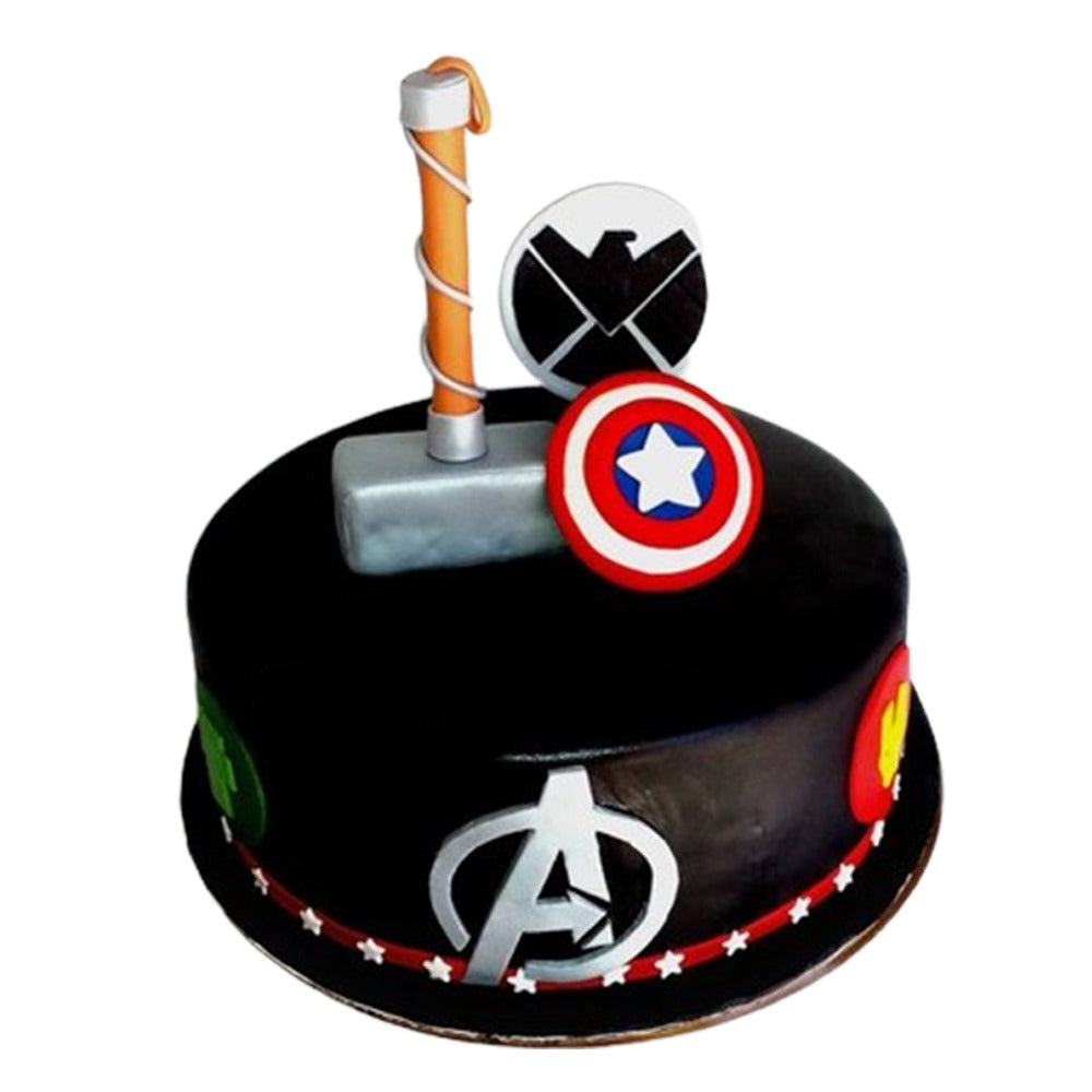 Avengers cake with fondant Captain America’s shield and Thor’s hammer