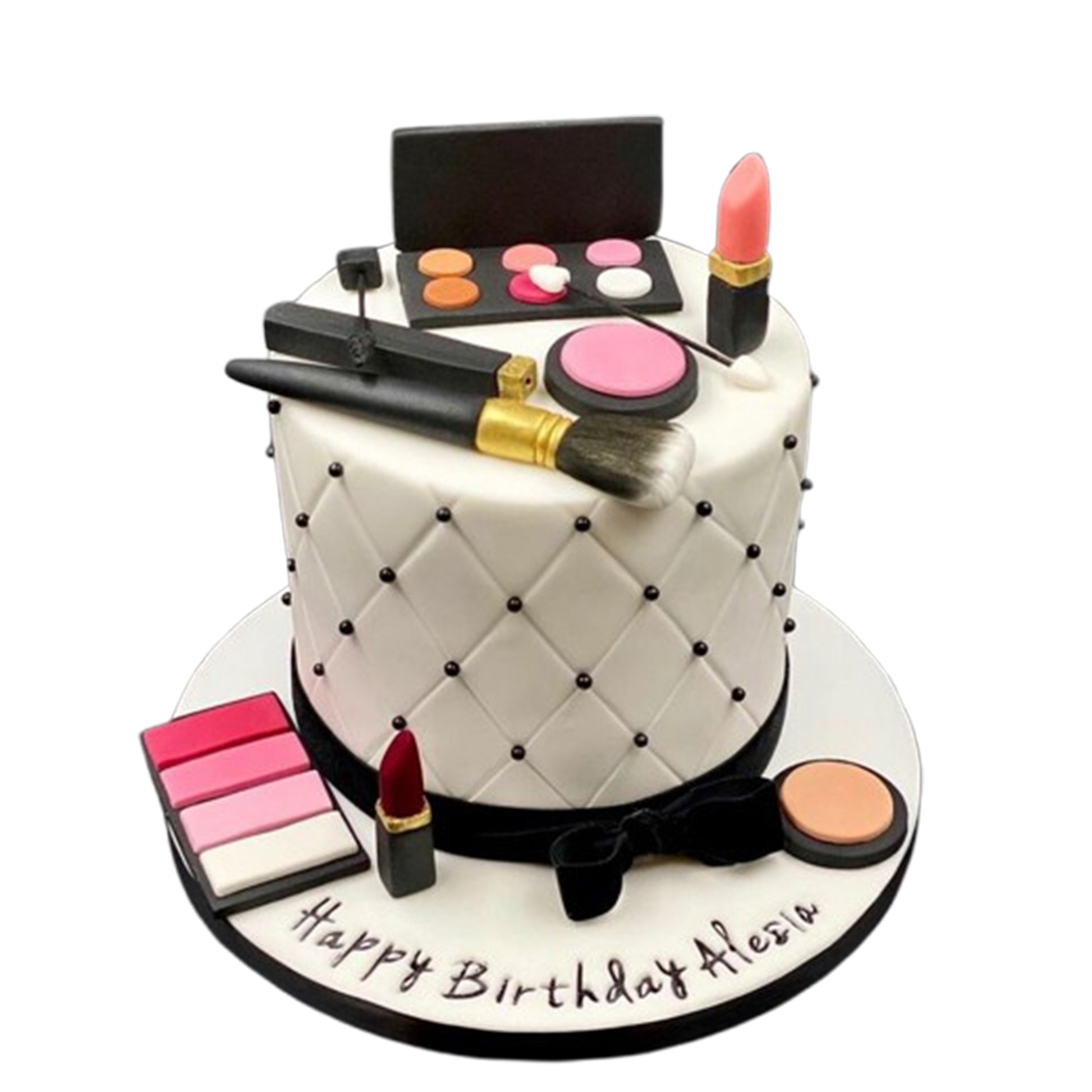 Exquisitely piped fondant makeup brush strokes and delicate eyelash details on a beauty-inspired cake.