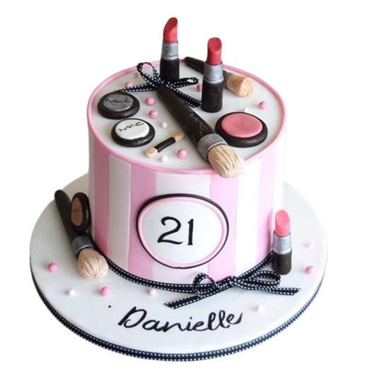 Artfully crafted fondant makeup products like lipsticks and mascara wands decorating a stunning beauty-themed cake.