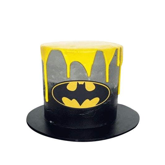 Batman Cake V13 - Batcave-themed birthday cake with rocky textures and glowing Bat-Signal on top