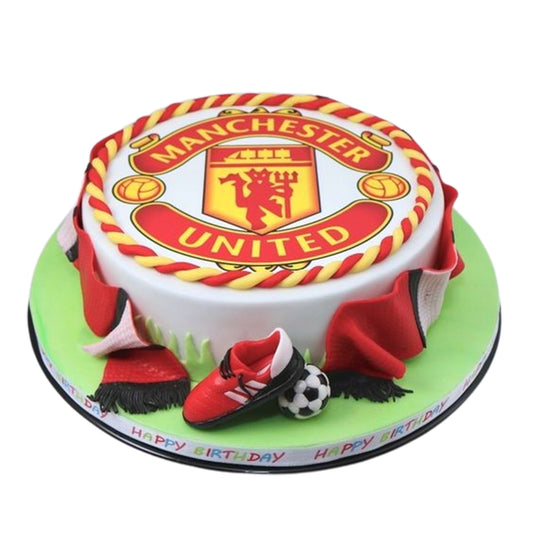 Manchester United celebration cake with edible gold/silver leaf, honoring the club's international triumphs in luxurious style.