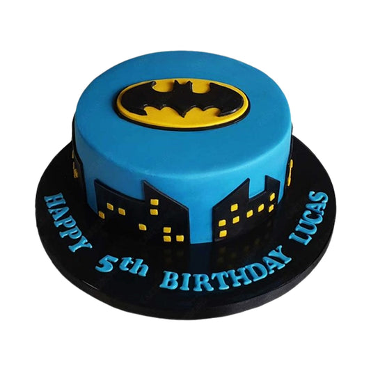Batman Cake V15 - round birthday cake with giant edible Bat-Symbol slicing through the top layer