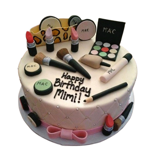 Miniature fondant beauty accessories on a cake