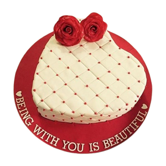 Heart-shaped cake symbolizing love, ideal for romantic occasions like Valentine's Day, anniversaries, or weddings