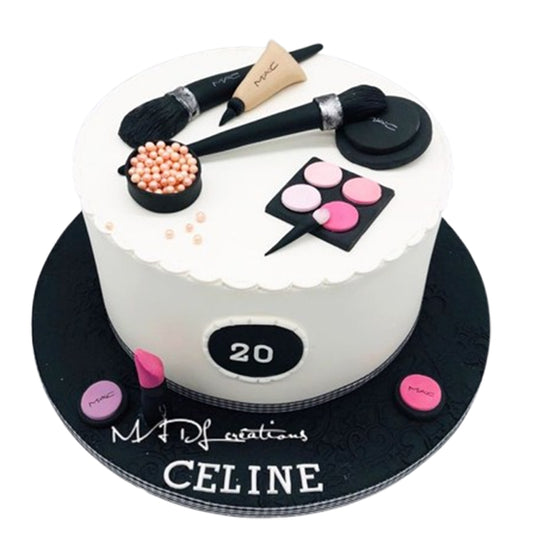 Vibrant makeup-inspired cake featuring fondant cosmetics in bold pinks, purples, and metallic gold and silver accents