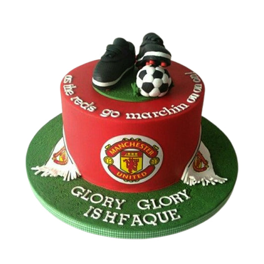 Manchester United-themed cake adorned with elegant red fondant roses, celebrating the club's iconic colors and heritage.