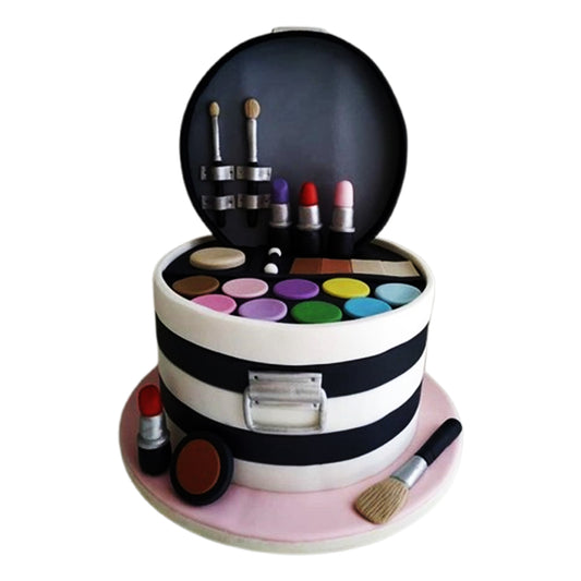 Bold, colorful makeup-themed cake with vibrant fondant details in striking pinks, purples and metallic finishes