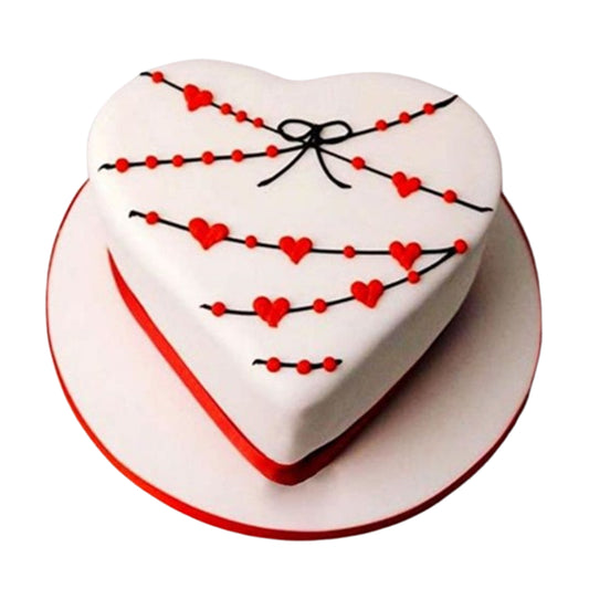 Symmetrical heart-shaped cake with soft, rounded edges and a distinct pointed bottom, offering a visually appealing and romantic design