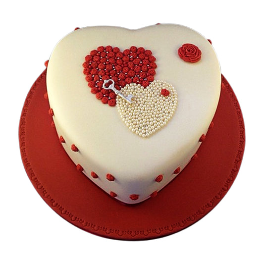 Heart-shaped cake featuring unique layers with fillings like fruit preserves, creamy ganache, and mousse for extra flavor.