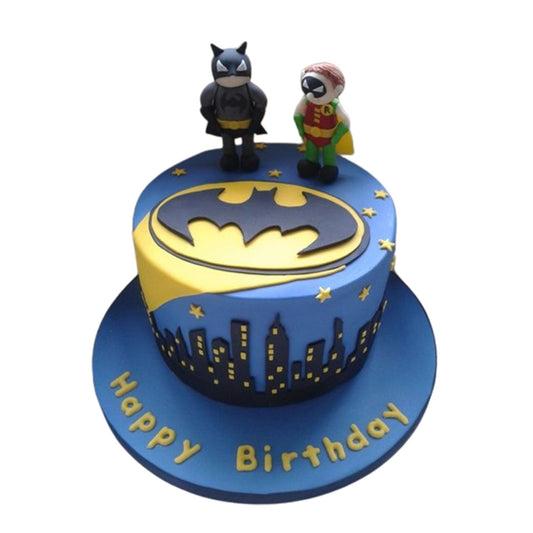 Batman Cake V2 - rectangular birthday cake with black fondant Gotham skyline sides and yellow Batman emblem on top